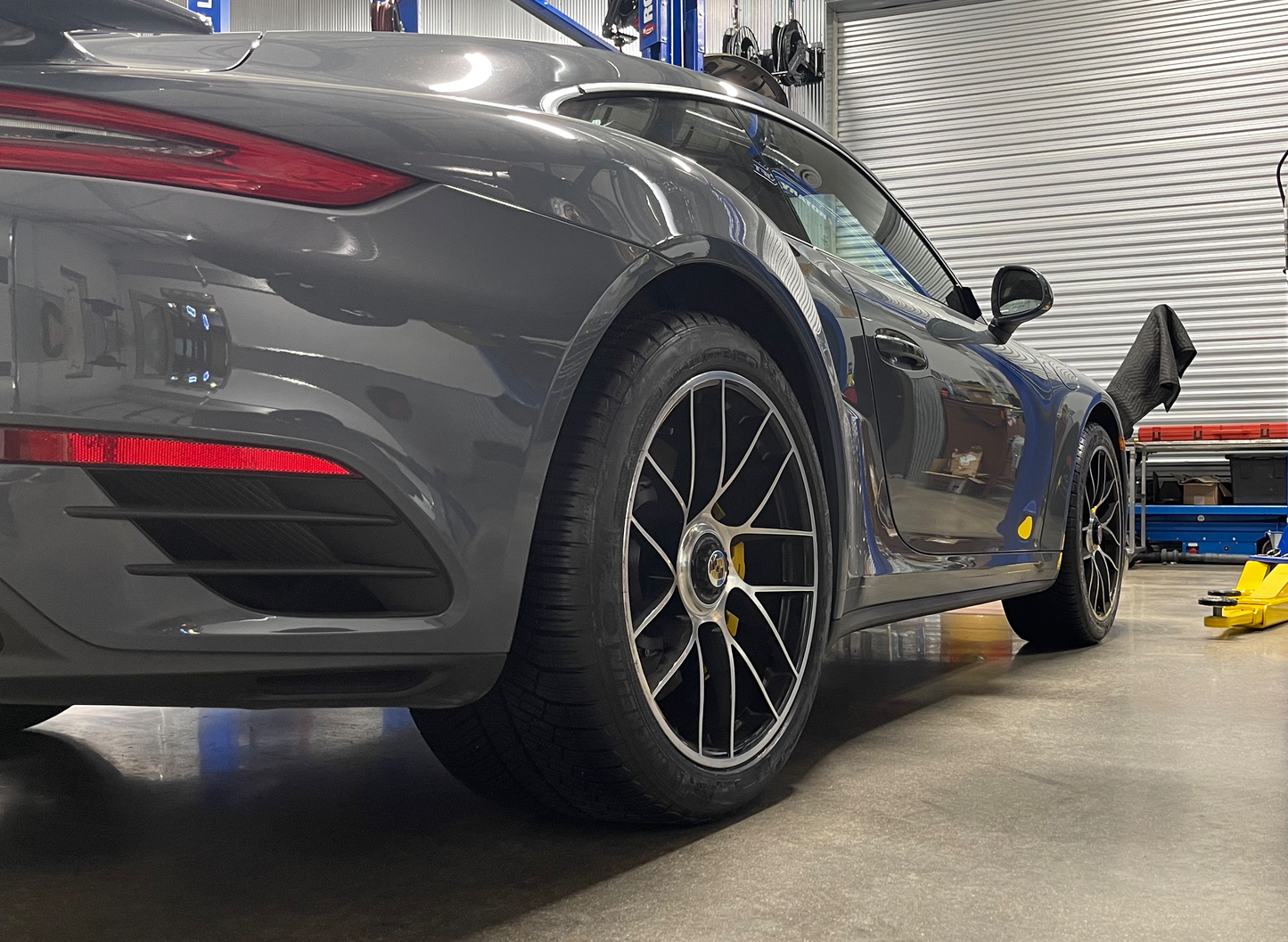 Side profile of Porsche 991 911 equipped with Berg Peaks lift kit showing increased clearance.